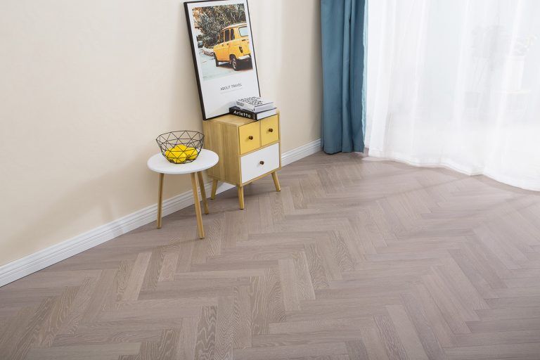 Commercial-grade brushed oak in slate grey. Ideal for hotels, offices, and retail environments